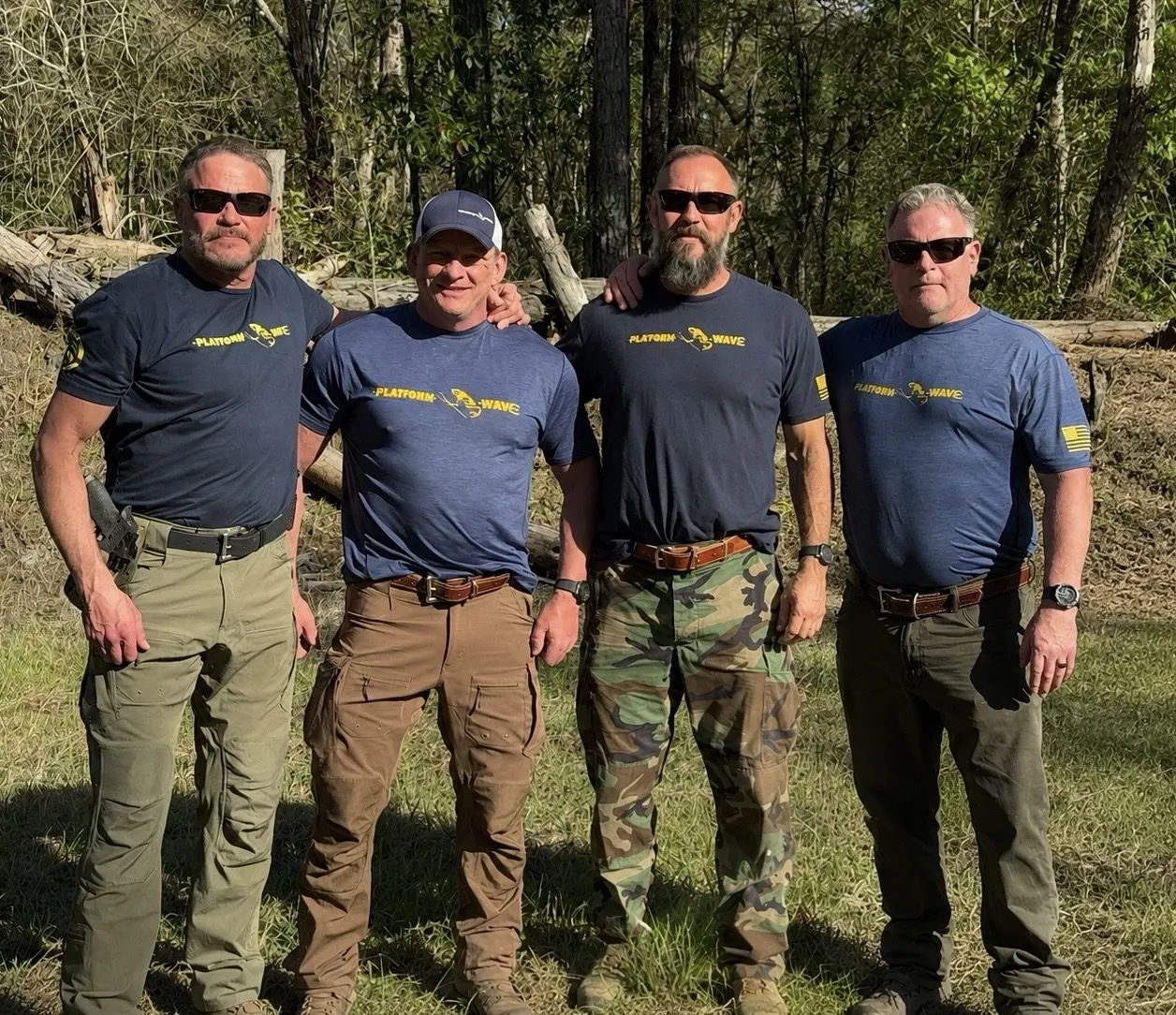 Elite operators standing in quiet professionalism, representing the legacy of fallen warriors.